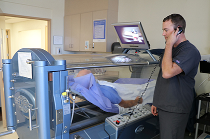 hyperbaric chamber2 Healthcare worker working with patient in Hyperbaric Oxygen Therapy Chamber