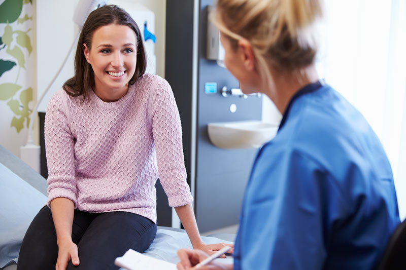 laparoscopic-hysterectomy Female physician speaking to a woman